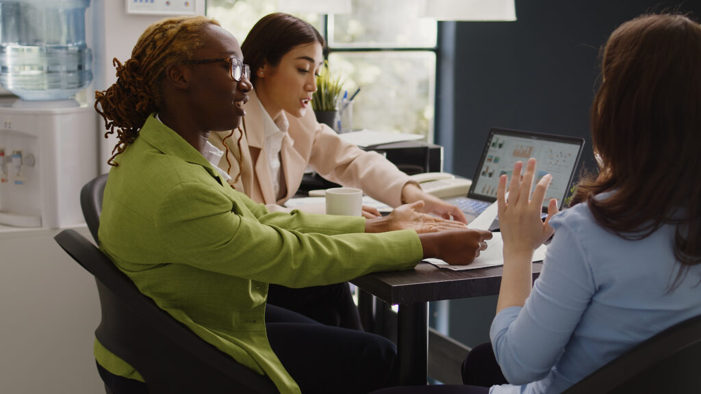 Direct sales professionals strategizing