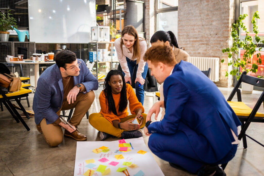 A team of professionals in a brainstorming session at work